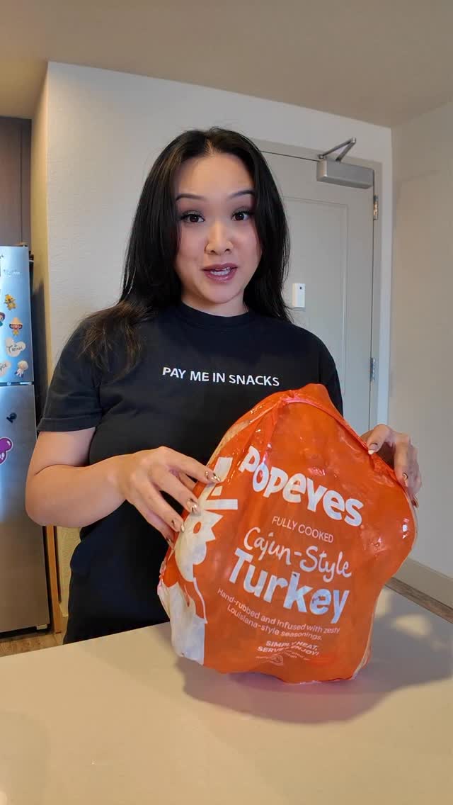 Instagram post by @trinhdoesthings for Popeyes. Caption reads: In-store pick is $59 and delivery is $99 🍗😋....