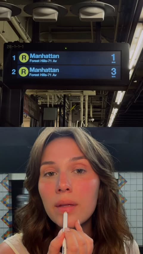 Instagram post by @goodwoodx for Glossier. Caption reads: [...] ready in a new york minute ☝️🍎🚇 with....