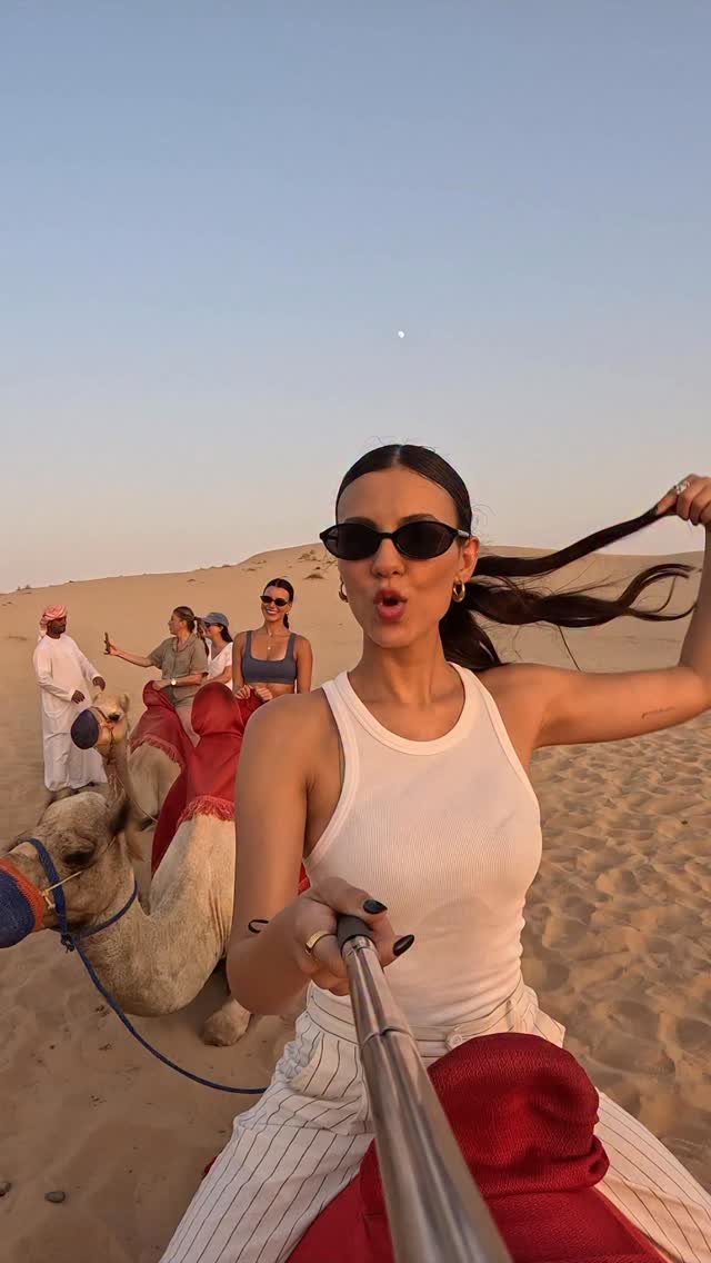 Instagram post by @victoriajustice for Visit Abudhabi. Caption reads: Desert dreams 🐪✨🥰 @visitabudhabi.