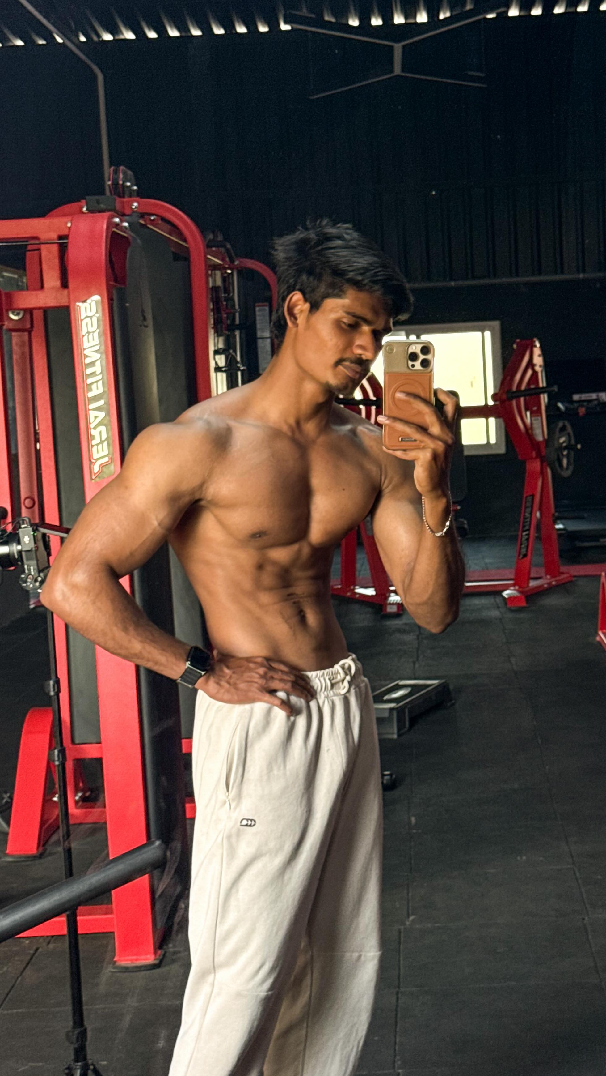 Instagram post by @_mr_eshwar_bolegar for MuscleBlaze. Caption reads: 23 years old me  Balancing work , Health & Fitness....