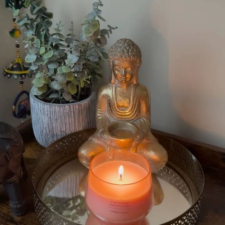Instagram post by @khush_reviewingtales for Yankee Candle. Caption reads: This Yankee Candle floral fragrance is absolute....