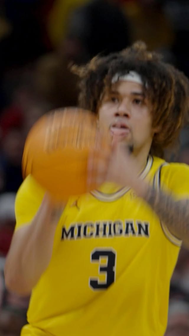 Instagram post by @b1gmbb for TIAA. Caption reads: [...] once again for the Wolverines 💪 📍 @tiaa....