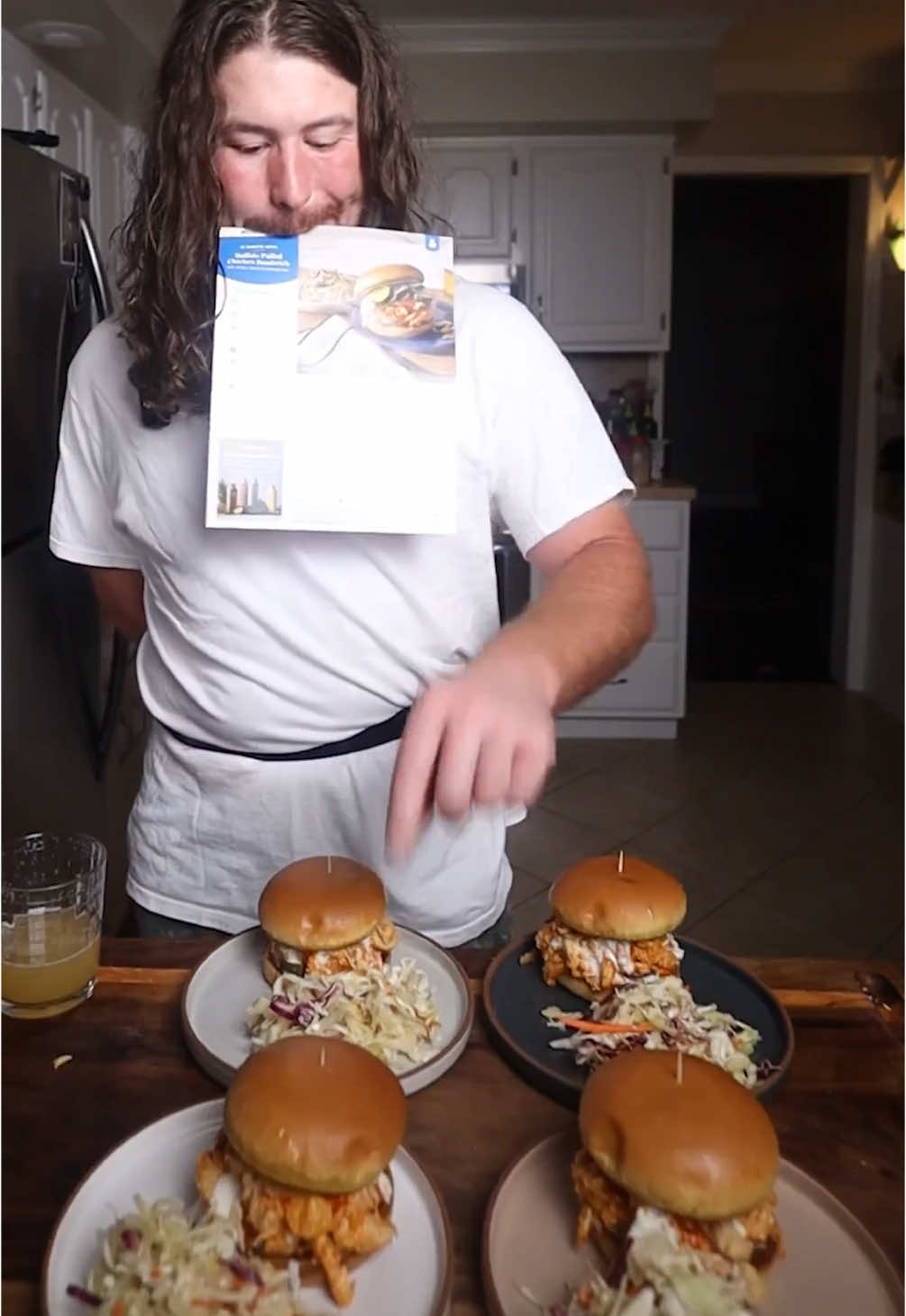 TikTok post by @codytriesstuff for Blue Apron. Caption reads: A pulled buffalo chicken sandwich so easy you can....