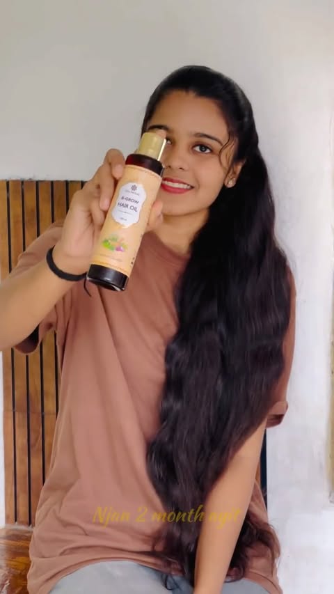 Instagram post by @vismaya__thejus for Balu Herbals. Caption reads: @Baluherbals B-grow hair oil combo of amla & [...].