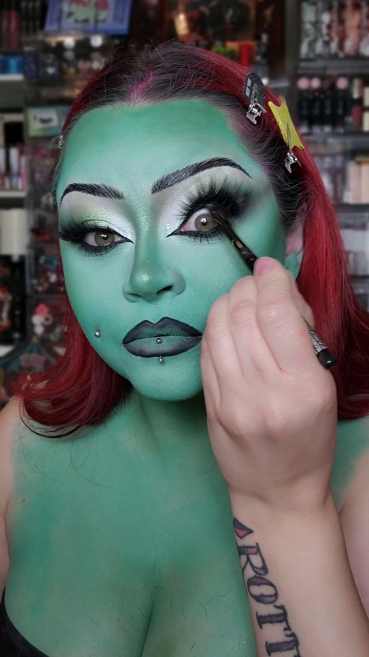 Instagram post by @sydneynicoleaddams for Sugarpill Cosmetics. Caption reads: Elphaba, The Wicked Witch of the West 💚🧹🫧🩷 I....