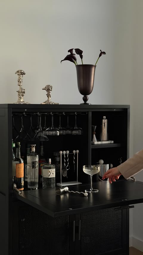 Instagram post by @katekxhome for Lulu and Georgia. Caption reads: [...] 🍸 Bar cabinet of my dreams from....