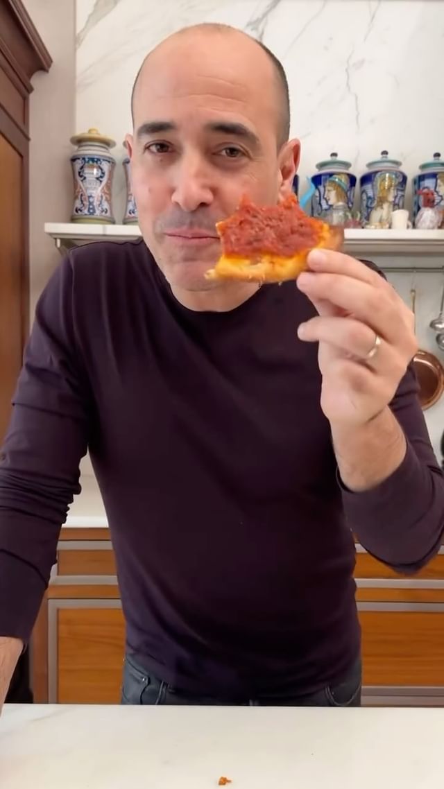 Instagram post by @davidroccosvita for Parmigiano Reggiano. Caption reads: A good pizza rossa calls for a really good tomato....