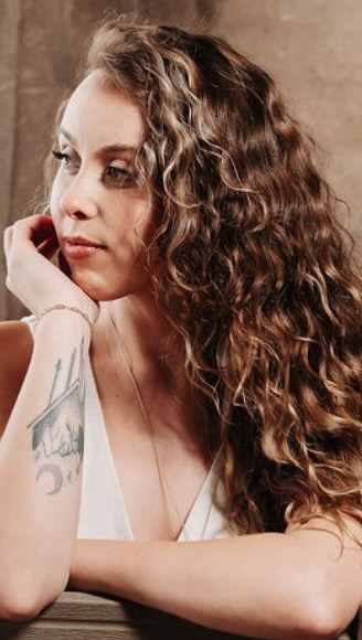 Instagram post by @thebaileylavender for DESIGNME Hair. Caption reads: 4th time using @designmehair curl products and I’m....