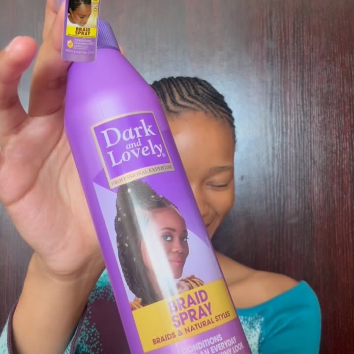 Instagram post by @liyabona.iliso for Dark and Lovely. Caption reads: Braids are my signature look, and keeping them....