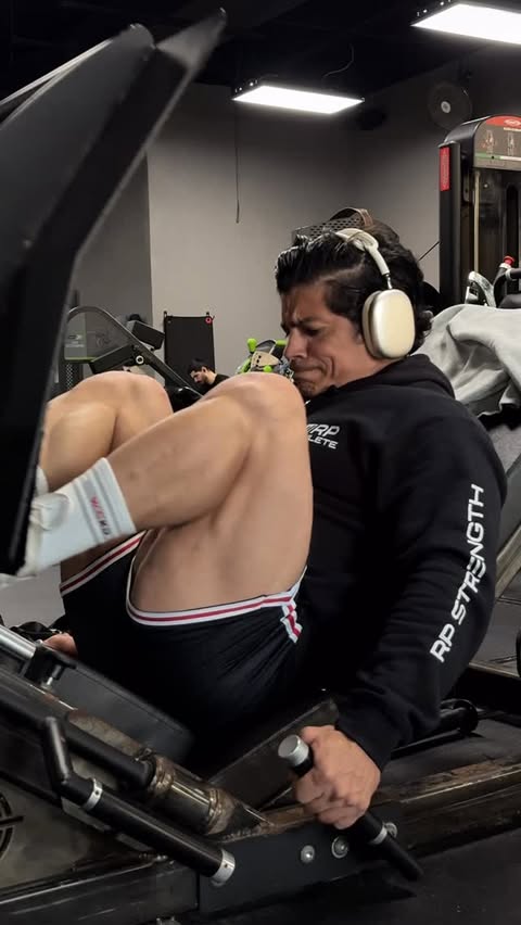 Instagram post by @dinoestrada14 for RP Strength. Caption reads: Leg workout optimized by @rpstrength 😤

The RP....