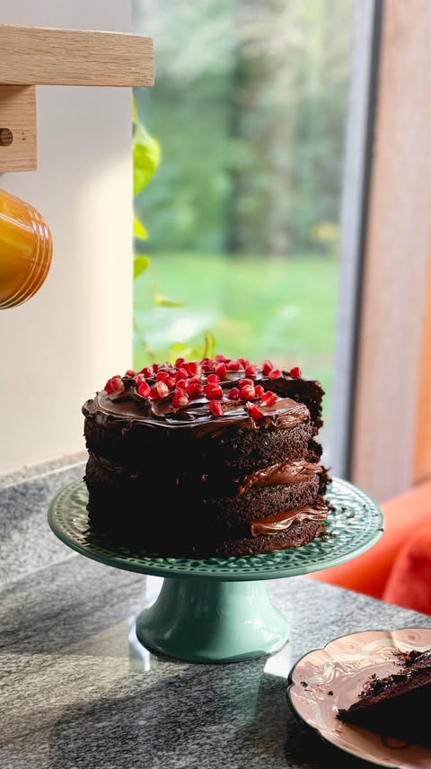 Instagram post by @marthacollison for Waitrose. Caption reads: Recipe 25 of 30 - Chocolate pomegranate cake with....