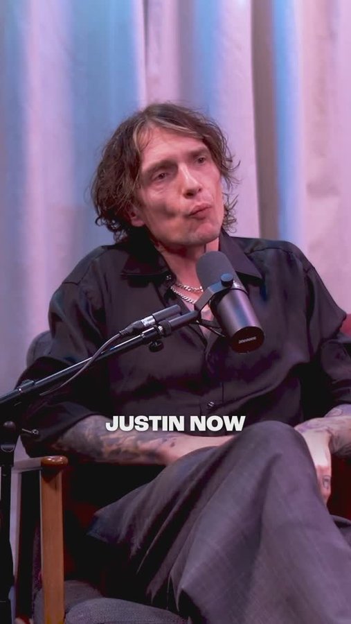 Instagram post by @yourpositivenews for Wondery. Caption reads: Musician Justin Hawkins shares his....