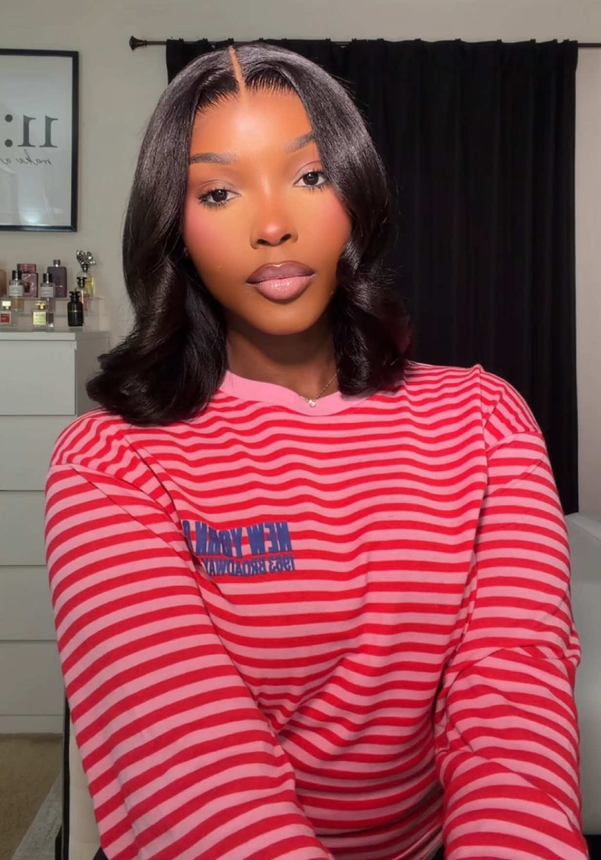 TikTok post by an influencer for Nadula. Caption reads: 🔥😻 @nadulahairwig @NadulaHair [...].