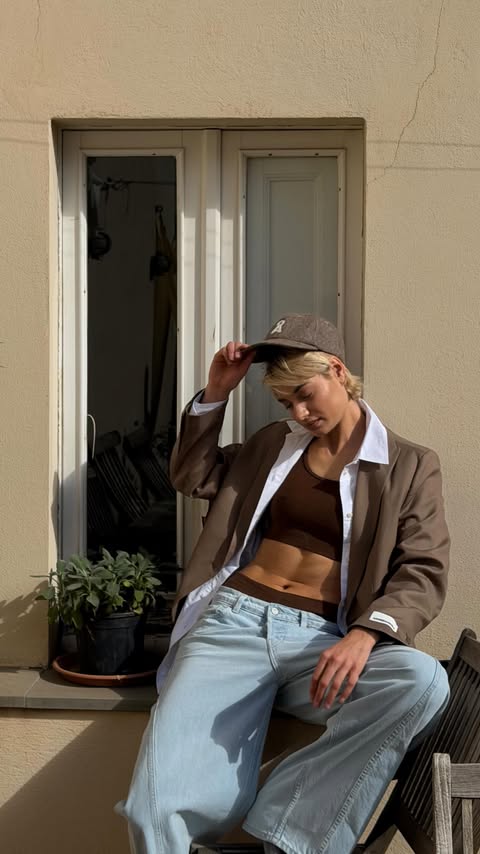 Instagram post by @sarahposch for ARMEDANGELS. Caption reads: [...] This autumn I’ve been wearing @armedangels....