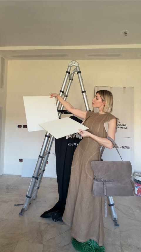 Instagram post by @cristinamusacchio for Moschino. Caption reads: Unboxing @moschino in cantiere perché nella vita....