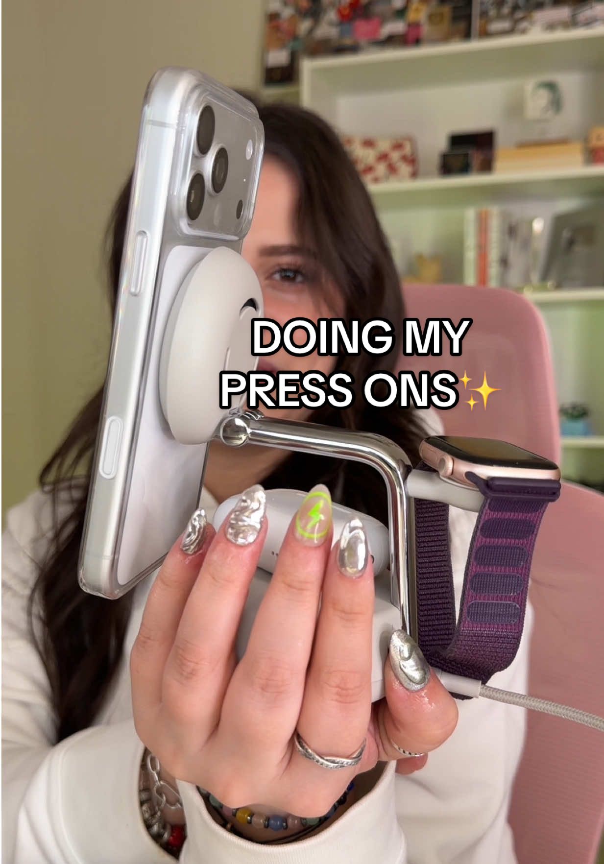 TikTok post by @heillyraices for Belkin. Caption reads: my nails and phone have something in common,....