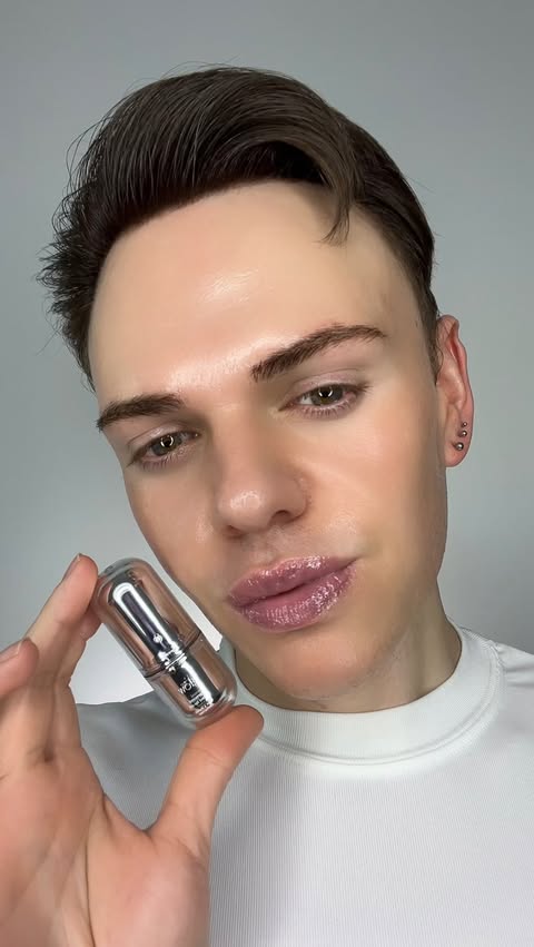 Instagram post by @joshwastjames for GLOW. Caption reads: glow’s diamond tinted lip oil is now available!....