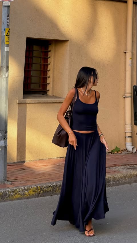 Instagram post by @selennergiz for SUUD COLLECTION. Caption reads: [...] #fyp #ootd #reklam Top and skirt....