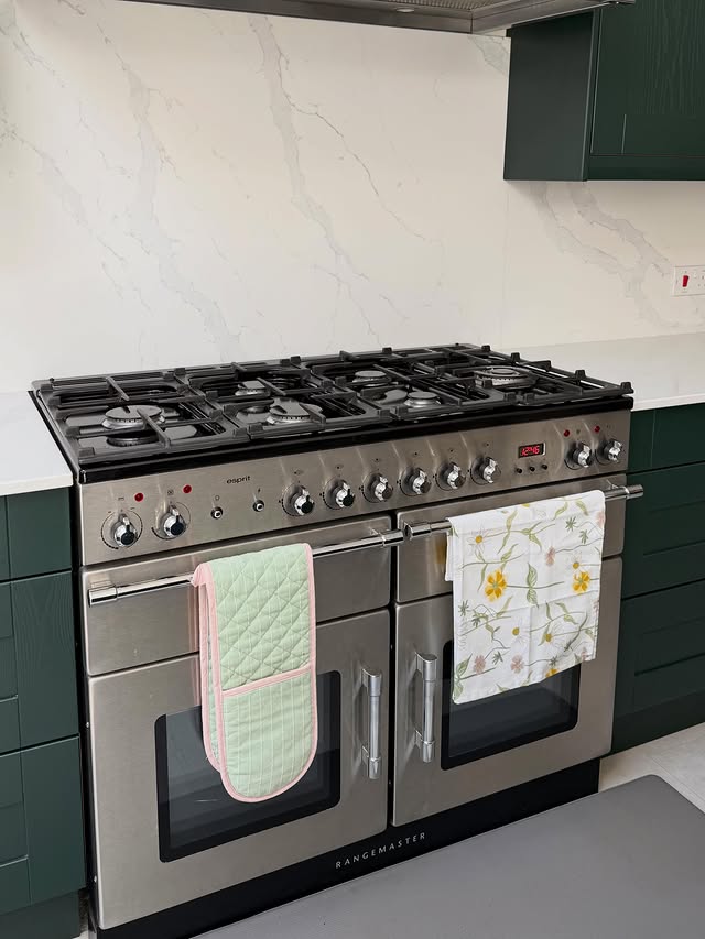 Instagram post by @ourhomerenovationsss for Trendcarpet. Caption reads: A small kitchen upgrade @trendcarpet 🌼 Use code....