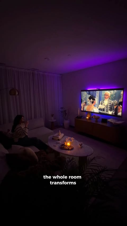Instagram post by @natalialevsina for Govee. Caption reads: [...] myself: candle, tea, and a good show. My....