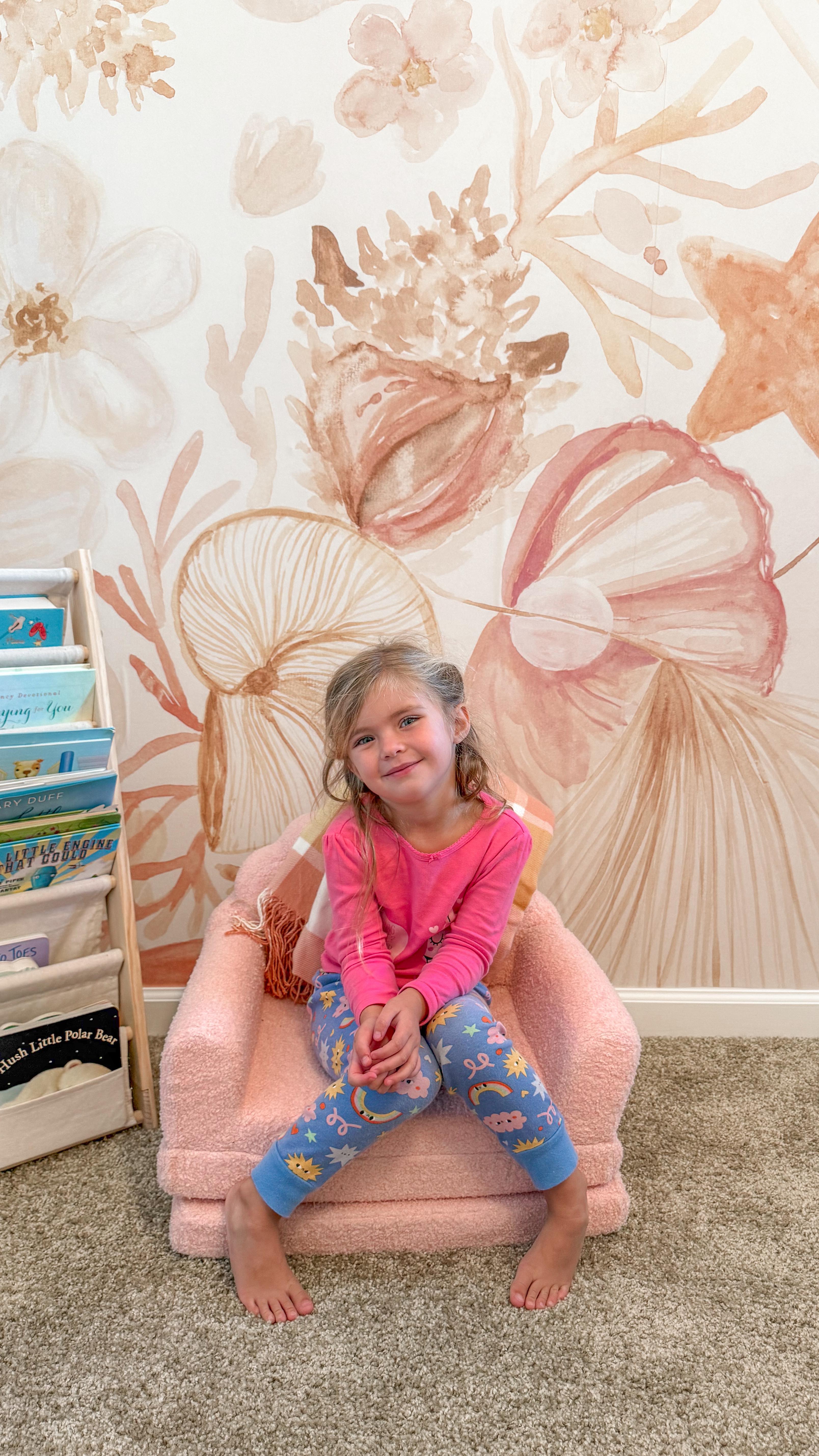 Instagram post by @madison_mitchell for Wallblush. Caption reads: Taking my daughter’s room from blank walls to a....