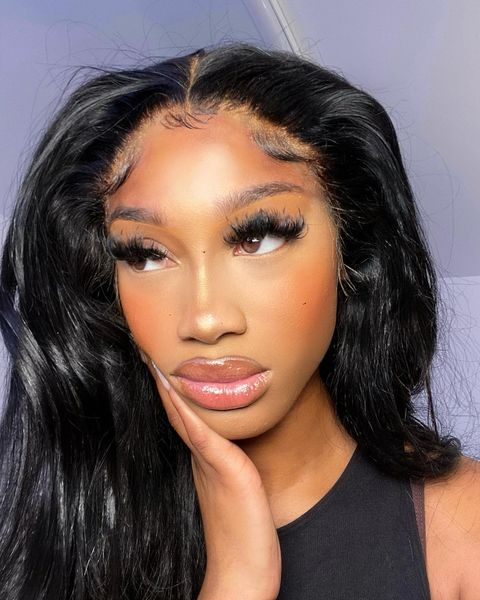 Instagram post by @adaure.nadine for Dolahair. Caption reads: Make it look easy...