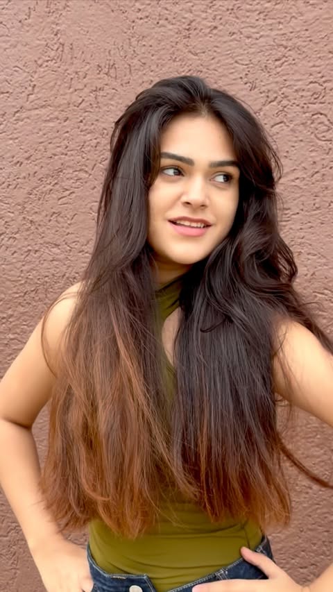 Instagram post by @saxenakhushay for Dabur. Caption reads: [...] nourishment. Happy hair.🪷🦚🌿💚 #ad....