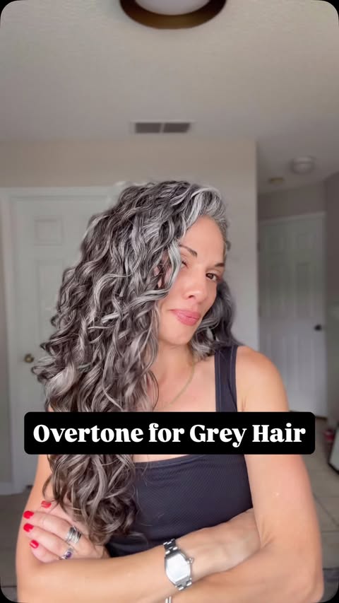 Instagram post by @growingsilvercurls for oVertone. Caption reads: [...] When I styled my hair after using oVertone....