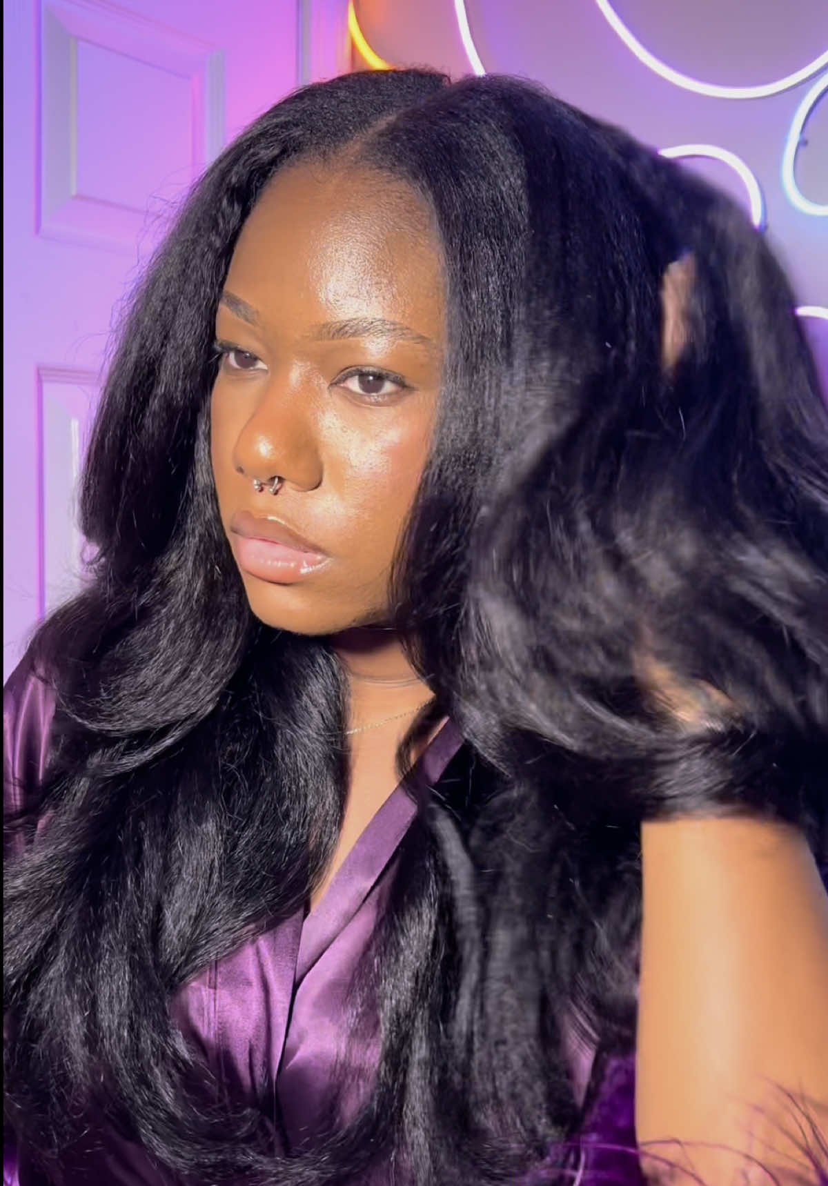 TikTok post by an influencer for Nadula. Caption reads: [...] 🙄🤣✨ WIG DETAILS 📌 from: @nadula hair....