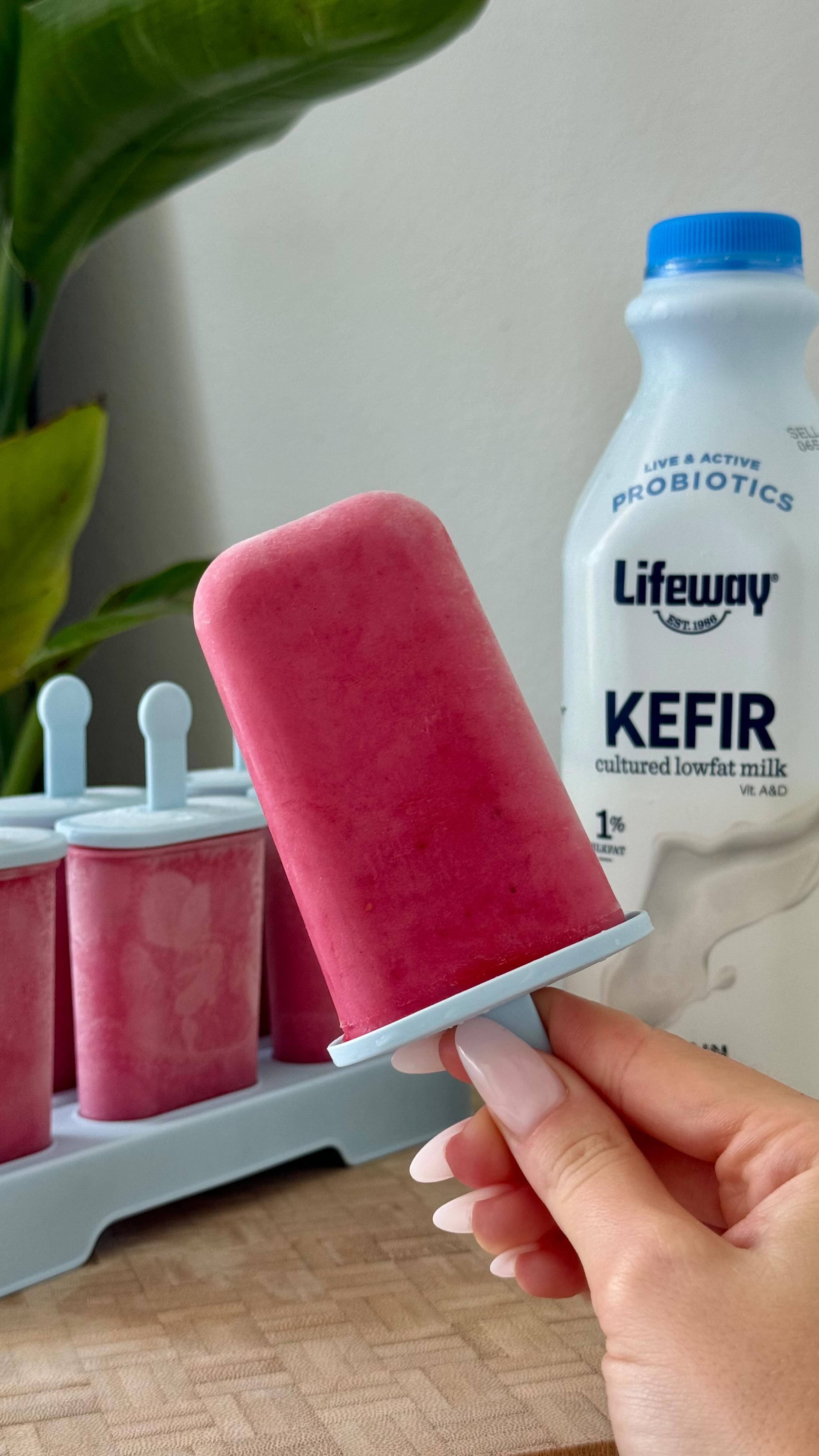 Instagram post by @health_by_lo for Lifeway Foods. Caption reads: The perfect summer treat☀️🍓These raspberry kefir....
