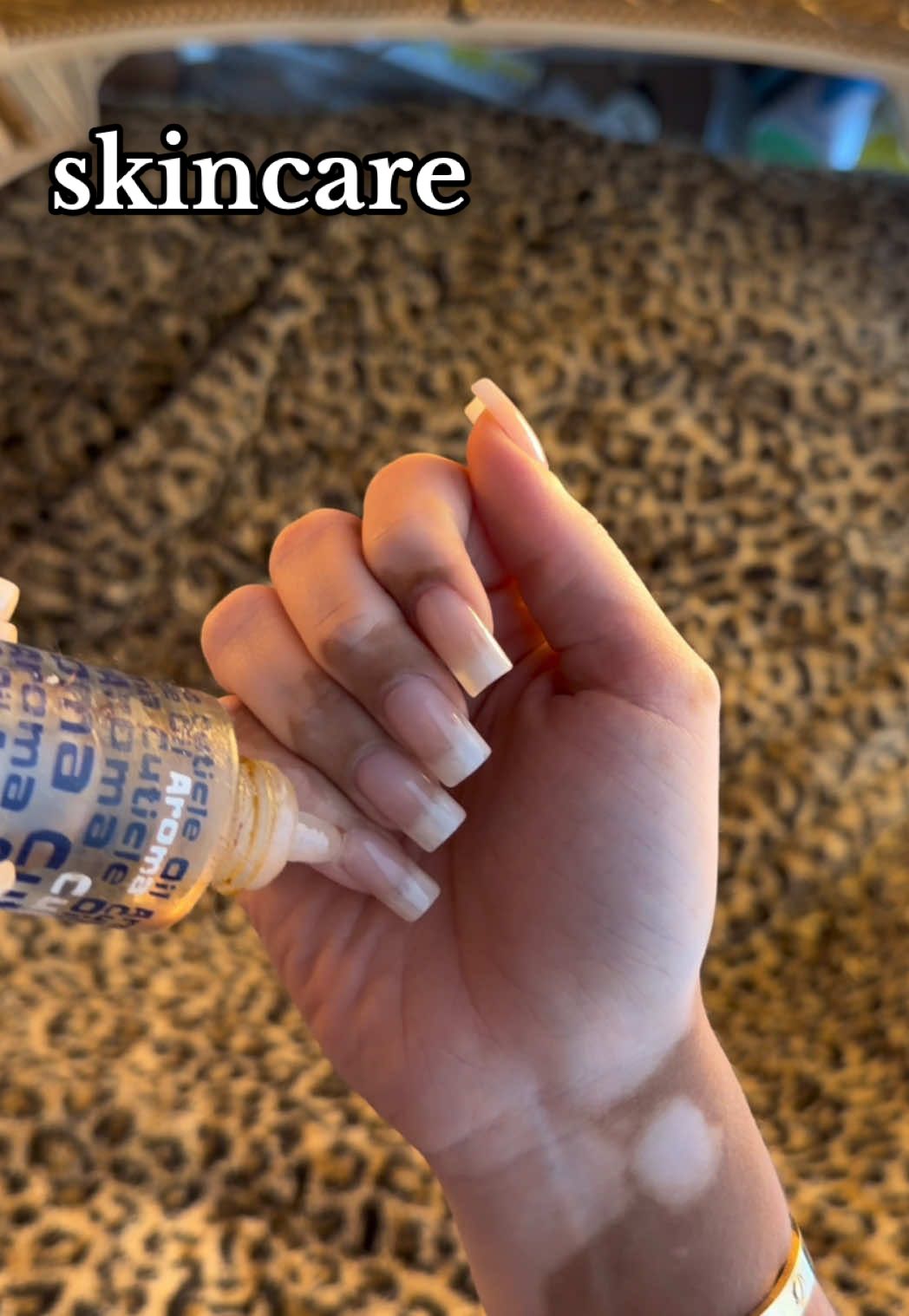 TikTok post by @esl.mov for Sunday Riley. Caption reads: [...] #nyc #vitiligo #beauty #wrinkles @AXIS-Y....