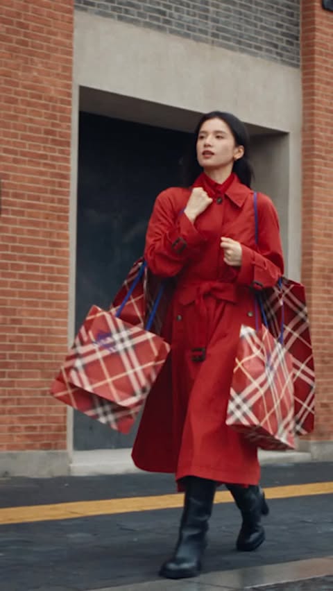 Instagram post by @zzhangjoy for Burberry. Caption reads: Celebrate in red

Brand ambassador Zhang Jingyi....