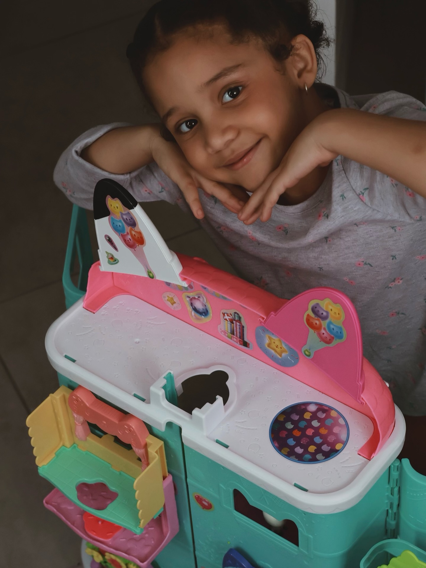 Instagram post by @tara_courtene_c for Prima Toys. Caption reads: Miss Asia is loving the new Gabby’s dollhouse with....