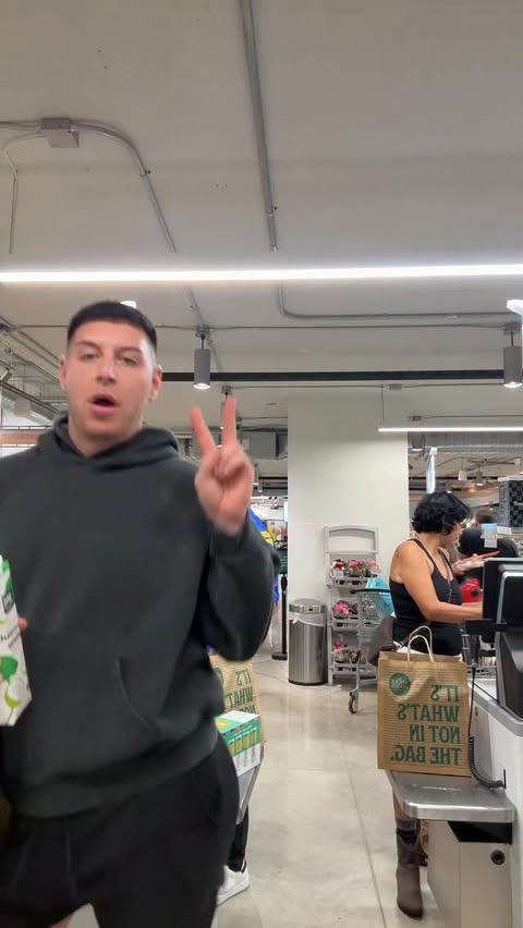 Instagram post by @lukethebaddy for Whole Foods Market. Caption reads: It’s the people in the back not paying any mind&....