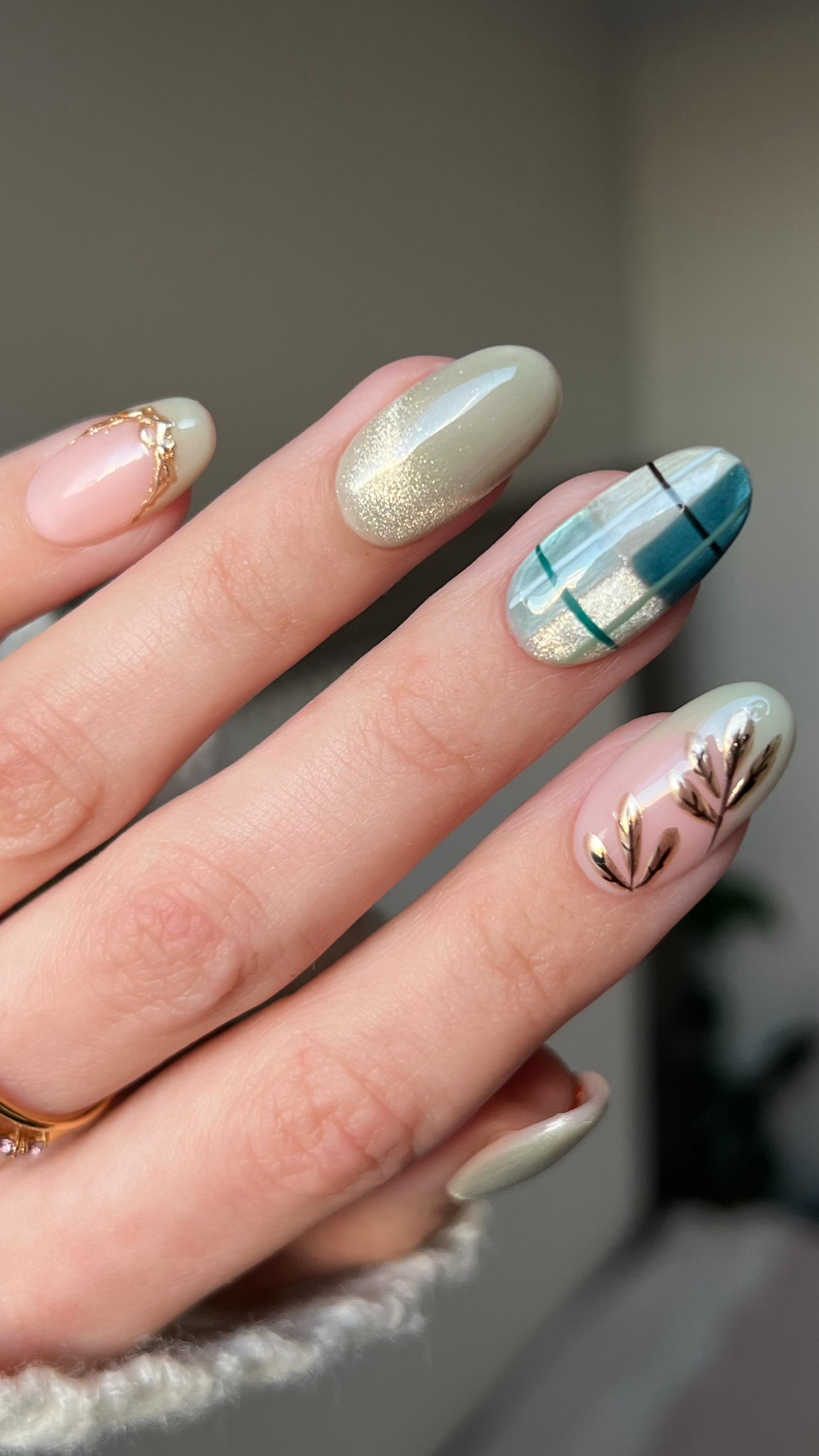 Instagram post by @finewinenails for Jewlr. Caption reads: matching muted fall tones to my newest @jewlr ring....