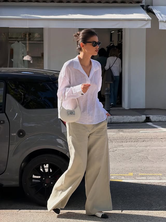 Instagram post by @cristinahudacov for Armani Exchange. Caption reads: Soft linen layers @armaniexchange #armaniexchange....