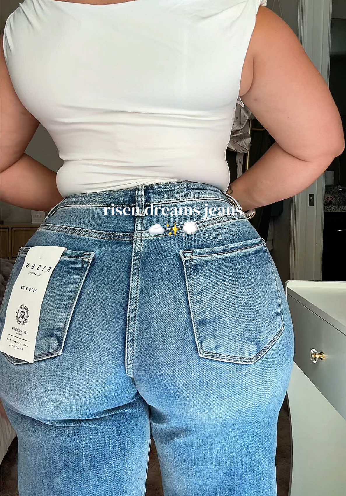 TikTok post by @maritza_travelmama for Walker Rose Boutique. Caption reads: @Walker Rose Boutique #dreamjeans #risenjeans....