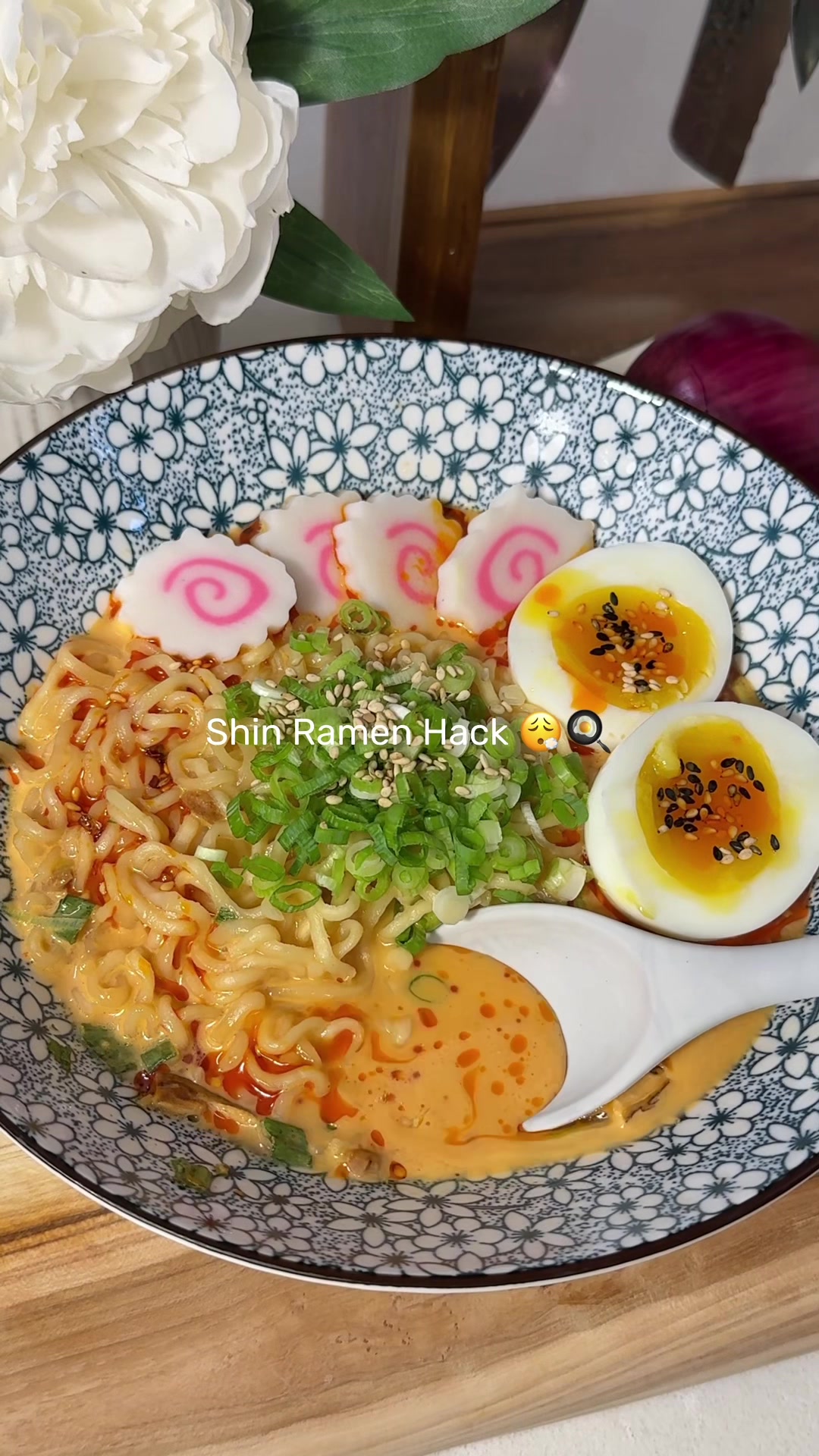 TikTok post by @foodierandy for Nongshim USA. Caption reads: My favourite Shin Ramen hack ! Thank you @Nongshim....