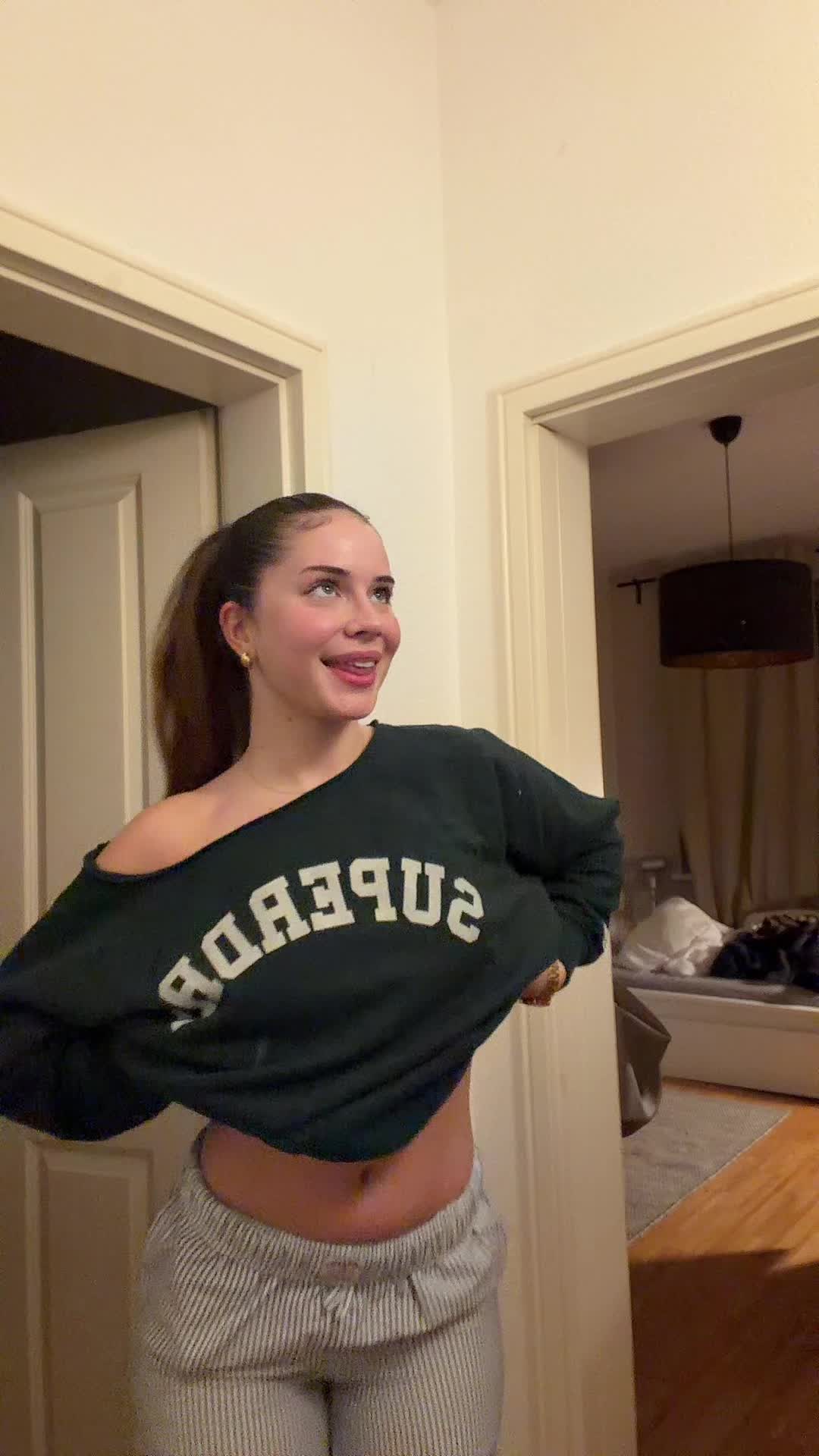 TikTok post by @emmaldkkk for Superdry. Caption reads: fit from @CULT by Superdry 🌿🤍..