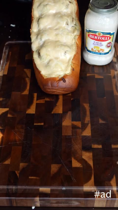 Instagram post by @firefoodfamily for Bertolli. Caption reads: [...] and Meatball Garlic Bread made with....