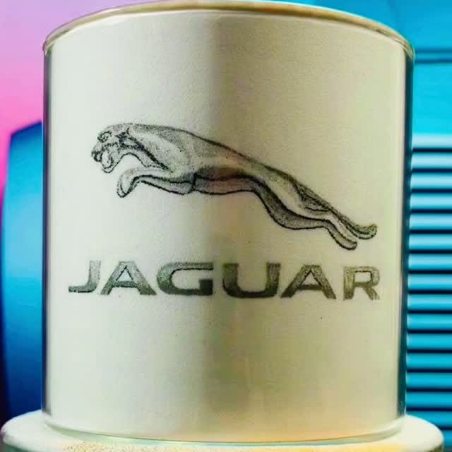 Instagram post by @fallinginsand for Jaguar. Caption reads: Challenge #2 of 100 Brands in Sand — Jaguar.
A....