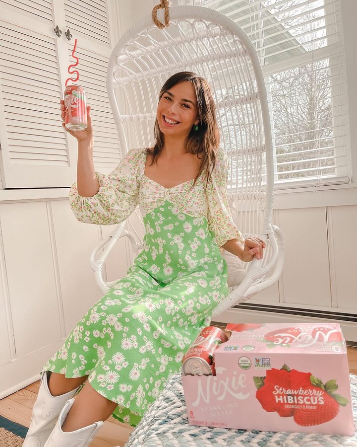 Instagram post by @luciejlass for Drink Nixie. Caption reads: Cheers to 1 Year of being a content creator with....