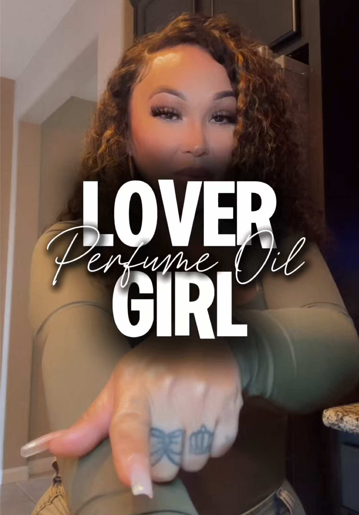 TikTok post by @queenc_707 for DLA COSMETICS. Caption reads: Lover Girl perfume oil by DLA Cosmetics @DLA....