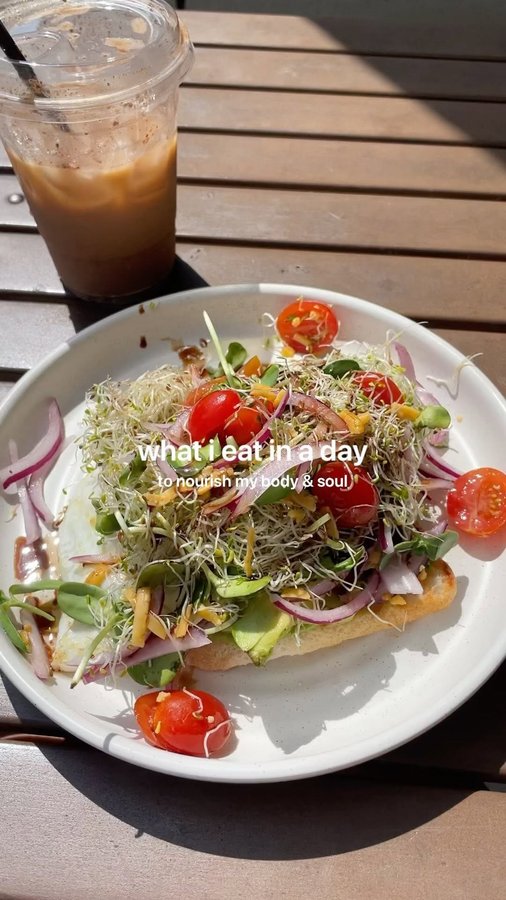 Instagram post by @cookinwithhalle for No Cow. Caption reads: what i eat in a day to nourish my body &....