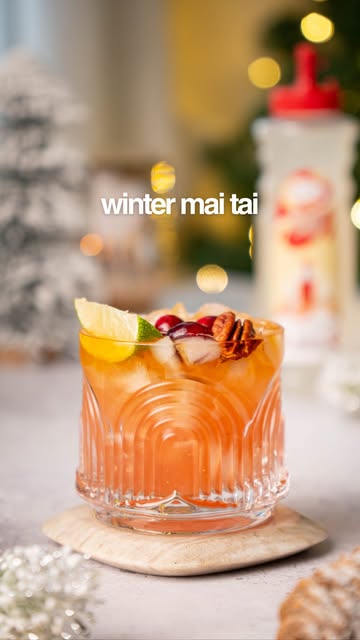 Instagram post by @itscocktailhour_ for Master of Mixes. Caption reads: Who says Mai Tais are just for summer? ❄️🍹....