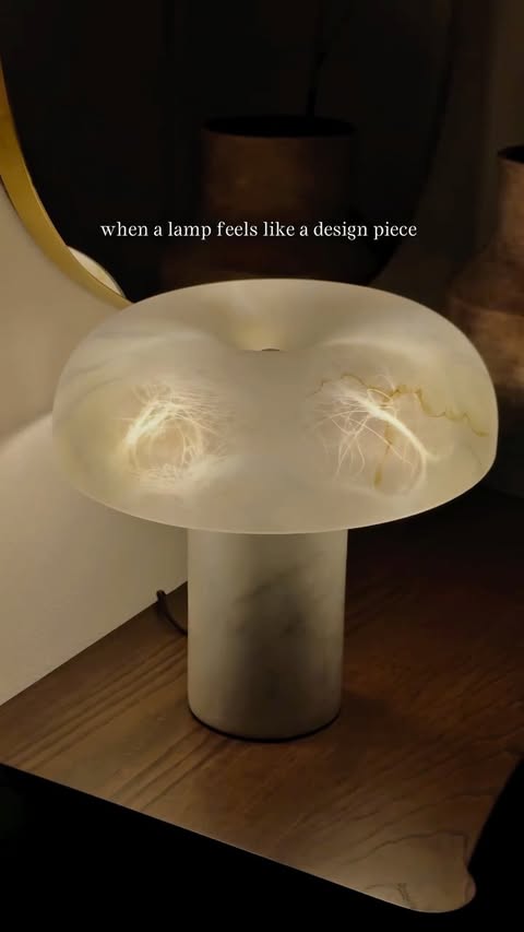 Instagram post by @neutral_homebody for Residence Supply. Caption reads: [...] glow. This alabaster lamp from....