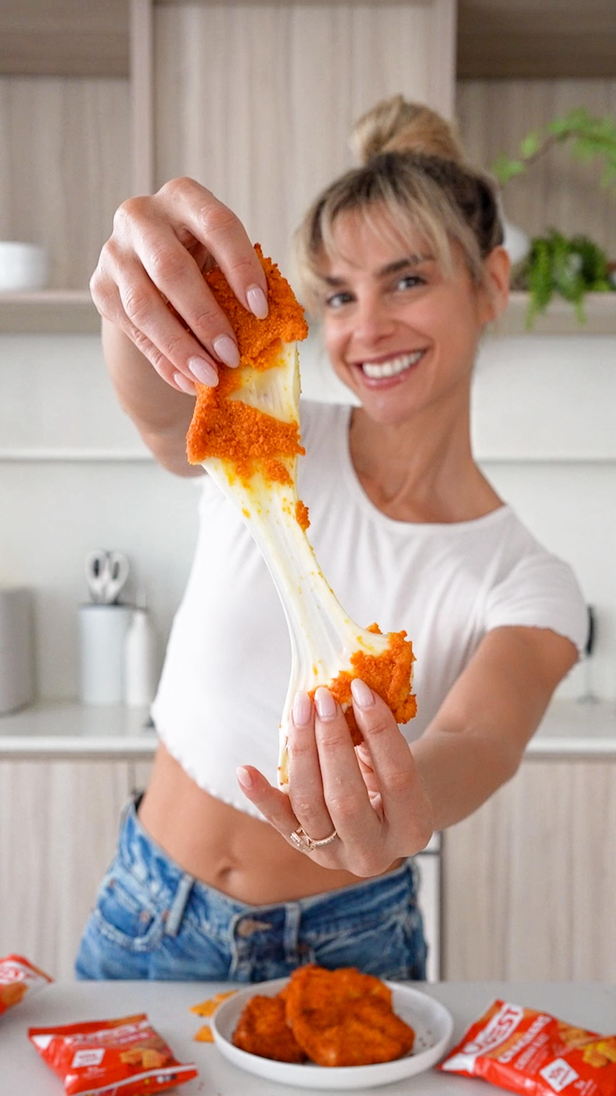 Instagram post by @cheatdayeats for Quest Nutrition. Caption reads: CHEDDAR BLAST Mozzarella sticks!! These are....