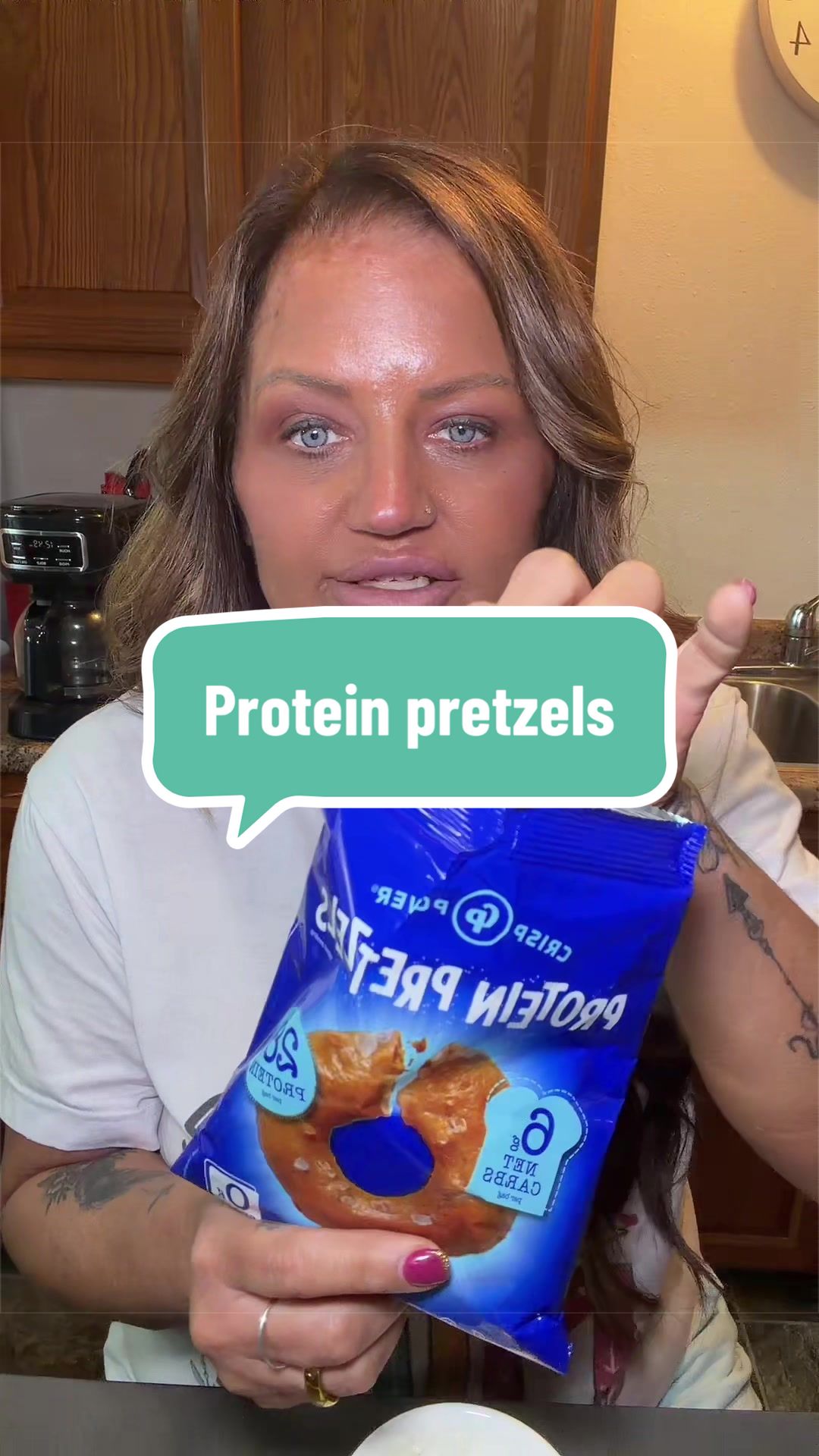TikTok post by @thescottpowells for Crisp Power. Caption reads: [...] #proteinpretzels #lowcarb @Crisp Power.