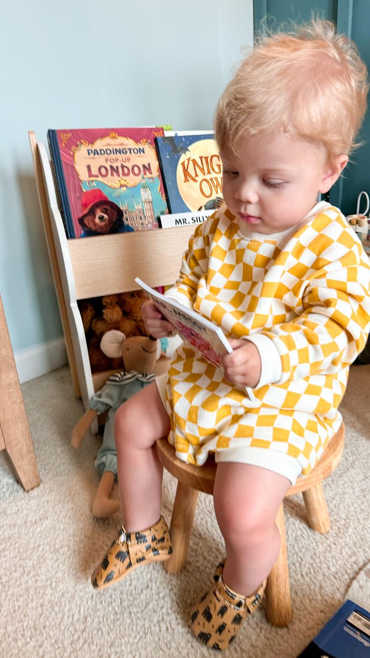 Instagram post by @terrimchugh for Freshly Picked. Caption reads: My boy love his new @freshlypicked adventure moccs....