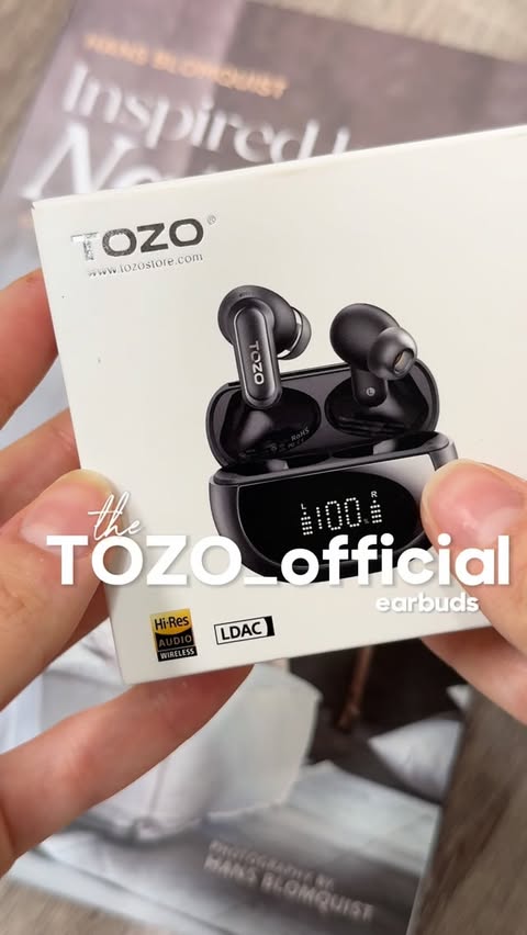 Instagram post by @herafery.gasimova for TOZOSTORE. Caption reads: Finally upgraded my earbuds! Loving the sound....